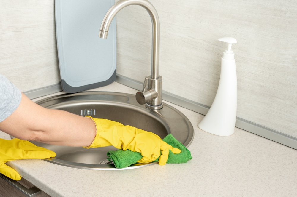 Deep,Cleaning,Service.,Woman,Gloves,Hands,Cleaning,Kitchen,Sink.,Surface